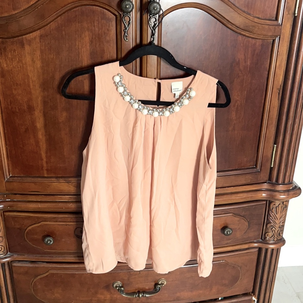 Top with pear and crystal accents